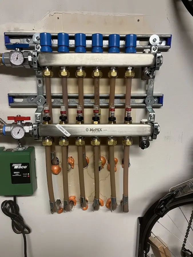 Plumber performing Gas Leak Detection at a residential property in Vassalboro